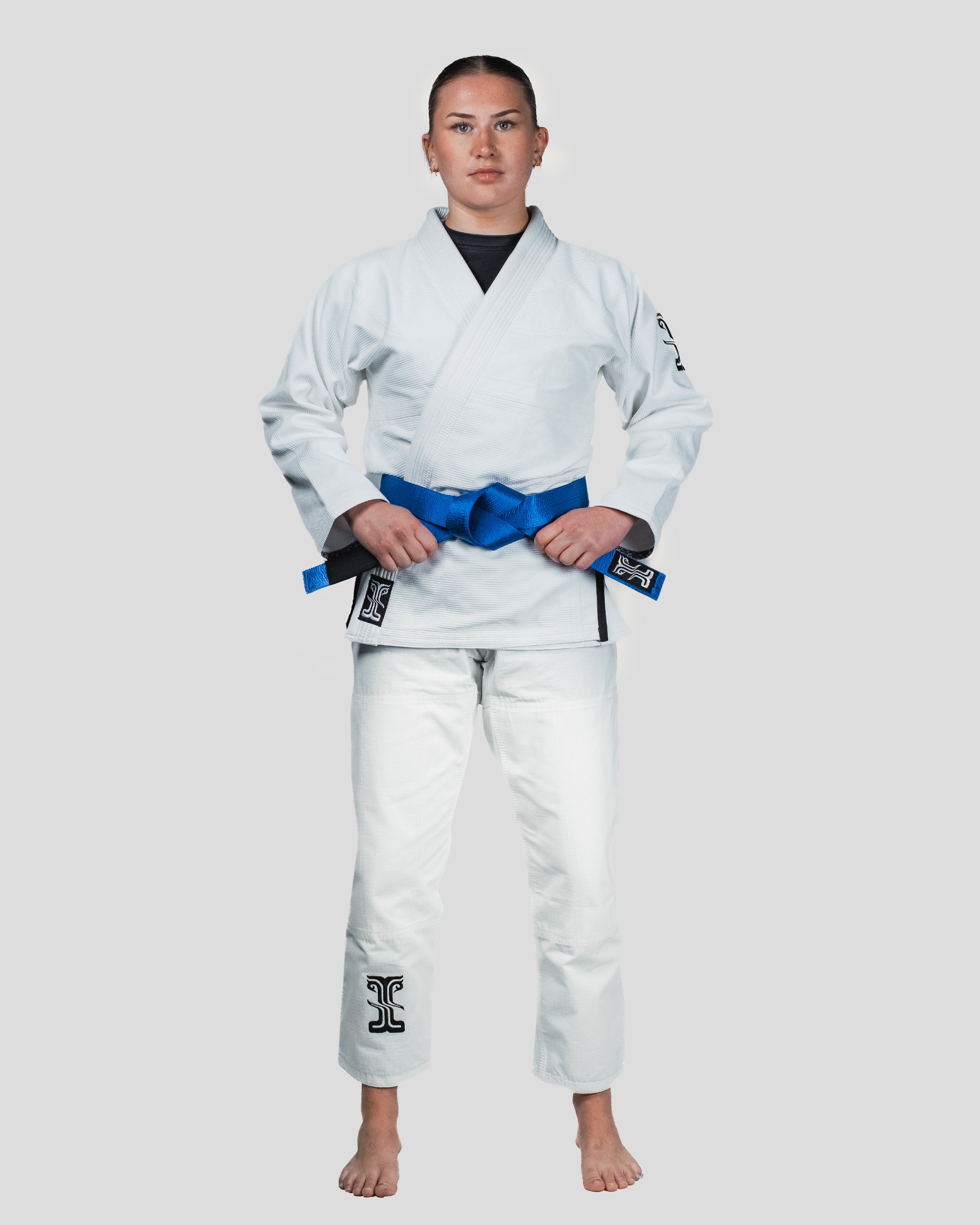 Full-body shot of the Guile Women's Jiu Jitsu Gi, designed for comfort and mobility during sparring and competition