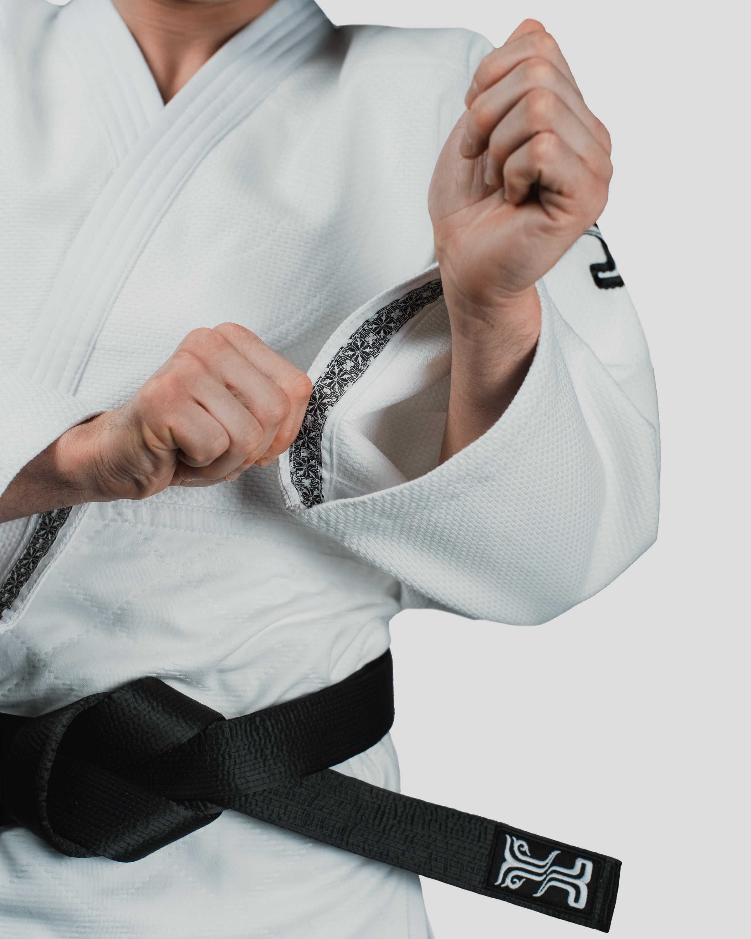 Close-up of the Stoa Gi Men's Judo sleeve, emphasising the detailed trim and thick, reinforced stitching