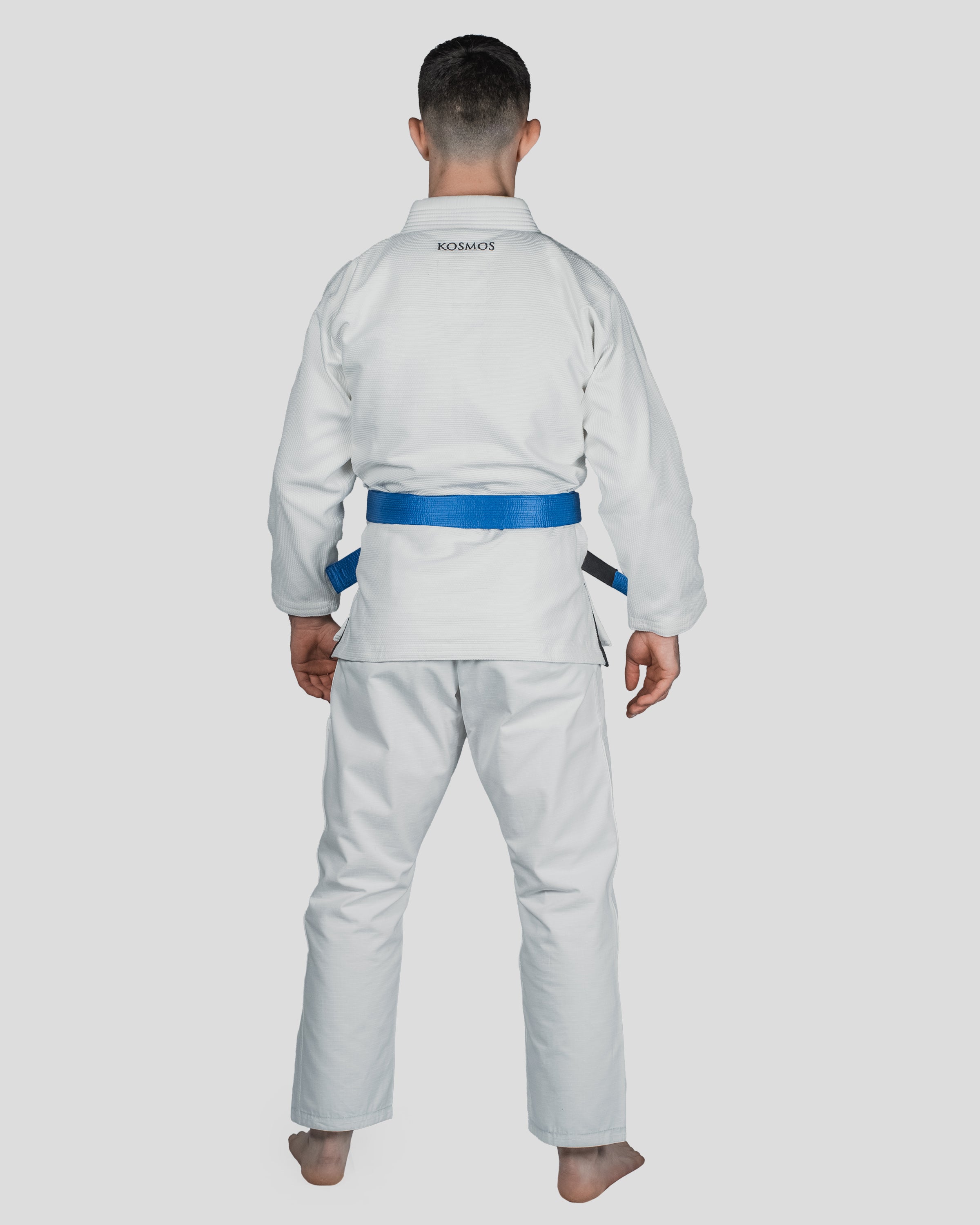 Full back view of the Guile Men’s Jiu Jitsu Gi, featuring the Kosmos logo and reinforced collar stitching