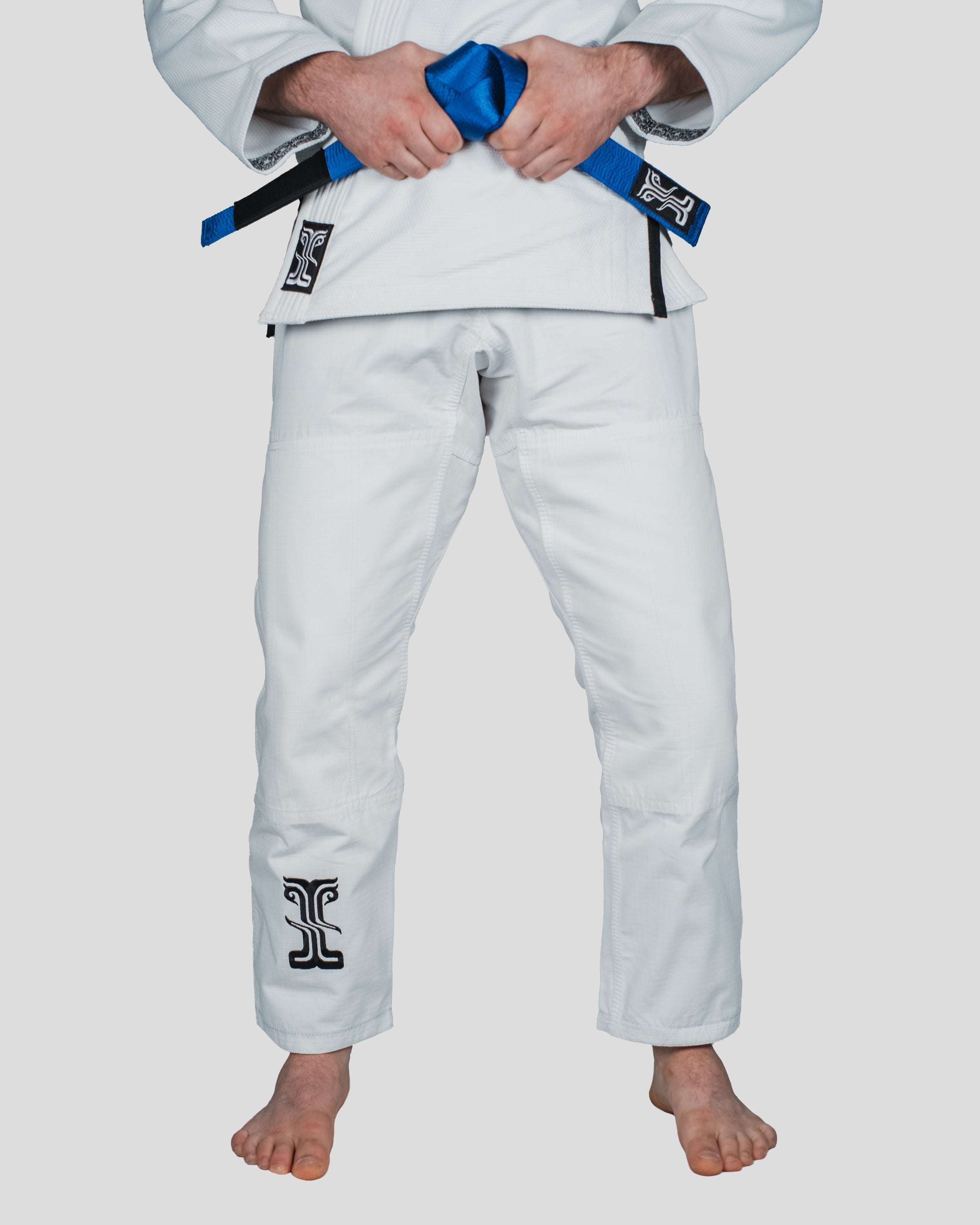 Close-up of a male athlete wearing Kosmos guile gi emphasising the pants
